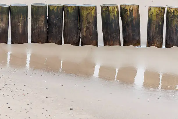 Wooden breakwater in Kolobrzeg, Poland.