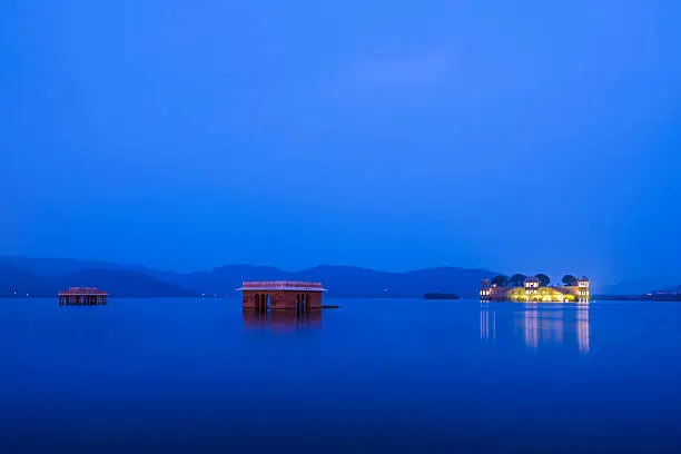 The Waterpalace, built in pink sandstone, is situated in a lake in the pink city of Jaipur in Rajasthan, India. The Jal Mahal Water Palace in Jaipur, India. Rajasthan landmark - Jal Mahal (Water Palace) on Man Sagar Lake in the evening in twilight. Jaipur, Rajasthan, India