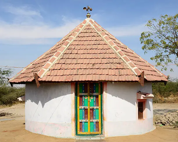 Traditionally decorated hut in the tribal village on the desert in India in the Gujarat state