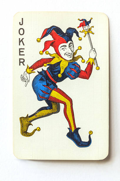 Joker on vintage playing card. stock photo