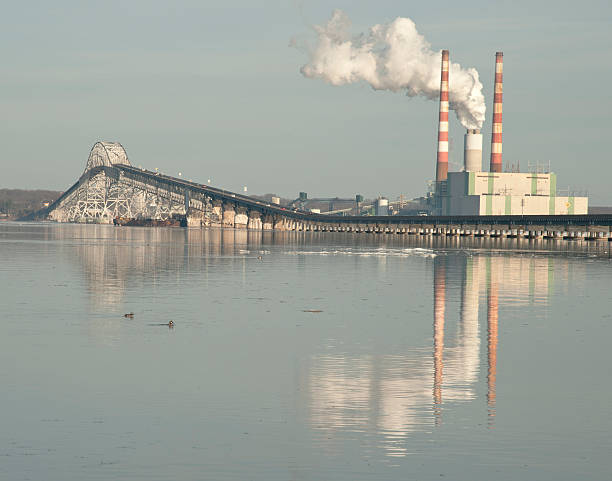 istock Coal fed power plant on the river 476210325