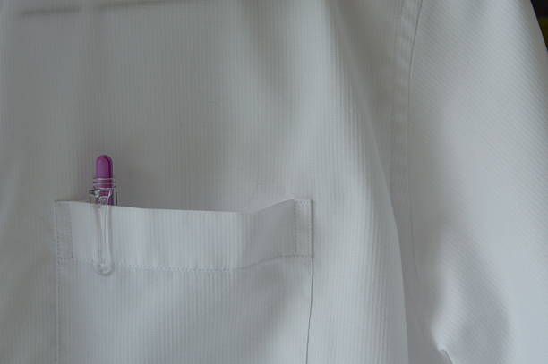 istock pen in white shirt pocket 476213024