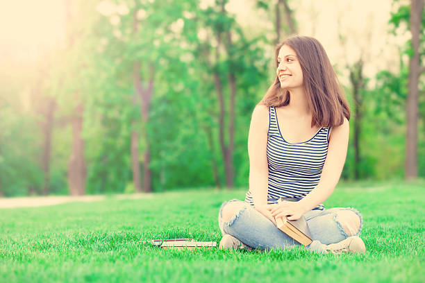 istock student girl with books 476213416
