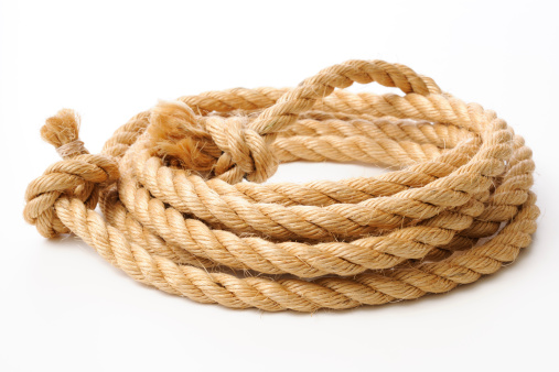 Brown spiral rope isolated on white background.