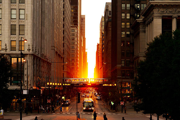 Chicago Magnificent Mile Sunset Chicago Millennium Park Sunset Between Buildings.  michigan avenue chicago stock pictures, royalty-free photos & images