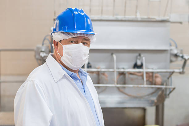 istock Man working at a food factory 476217506