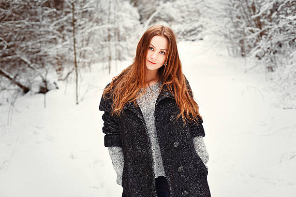 young girl winter outdoor portrait stock photo