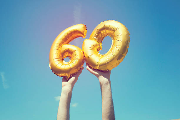 Gold number 60 balloon stock photo