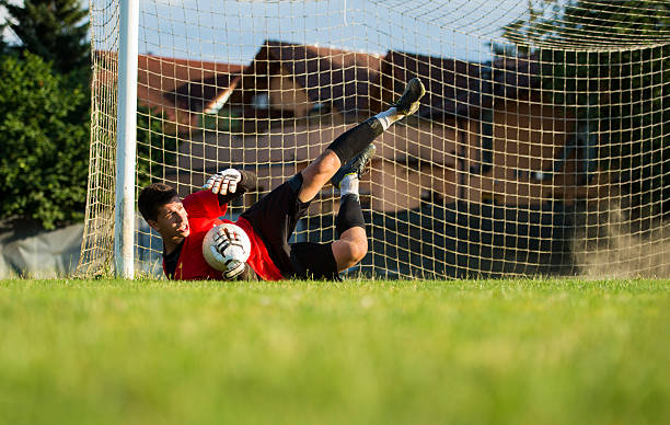 istock Soccer goalie in defending action 476220189