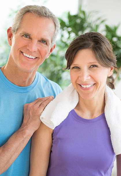 istock Happy Fit Couple Standing Together 476220297