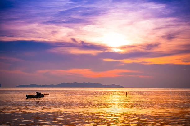 istock Beautiful silhouette sunset at tropical sea 476220643