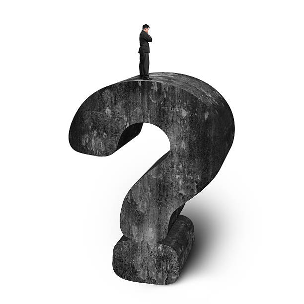istock Businessman standing on huge 3D concrete question mark white bac 476222308