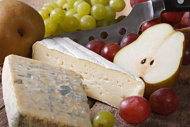 istock Molded cheese, grapes and pears close-up. horizontal 476222398