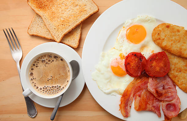 istock Traditional English Breakfast, bacon and egg with coffee 476223462