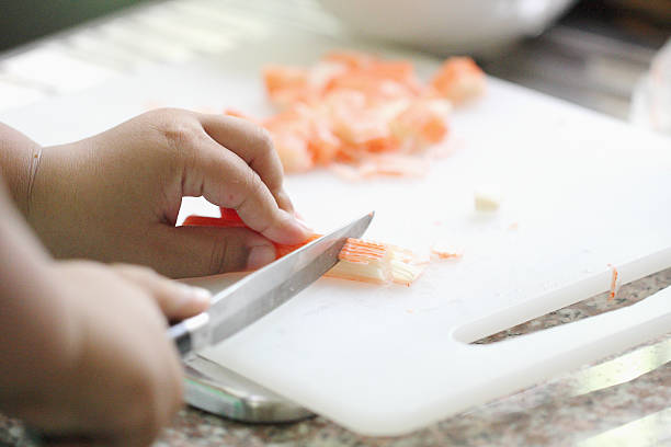 hand of boy are cookking