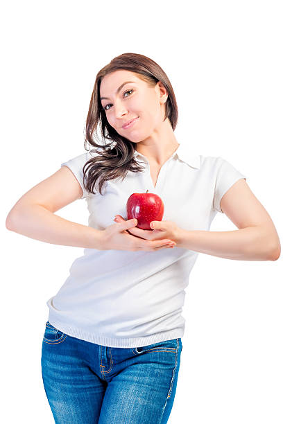 istock girl holding a ripe apple isolated 476225966