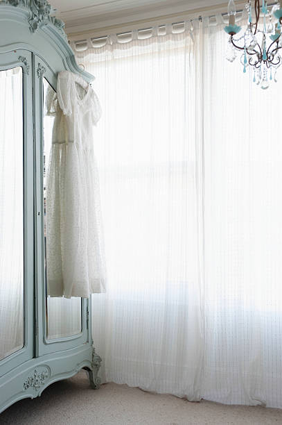 istock Christening Gown On Wardrobe 476226737