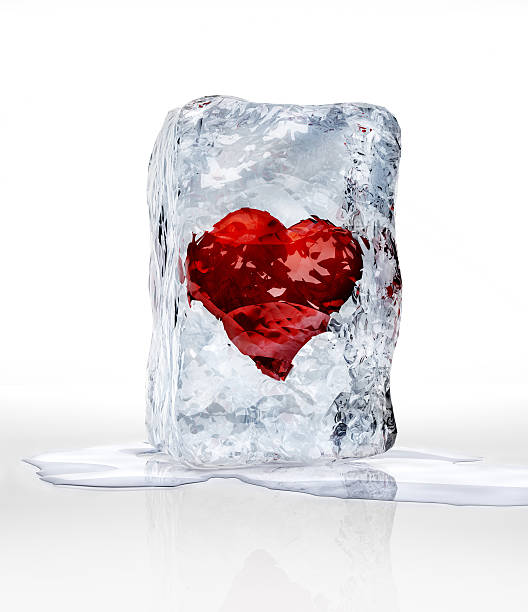 istock Red heart into an ice brick, over a white surface. 476226867
