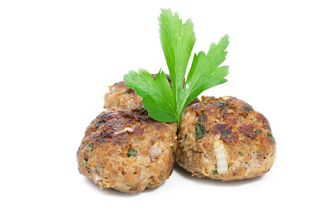 istock Freshly fried meat balls on white background 476227173