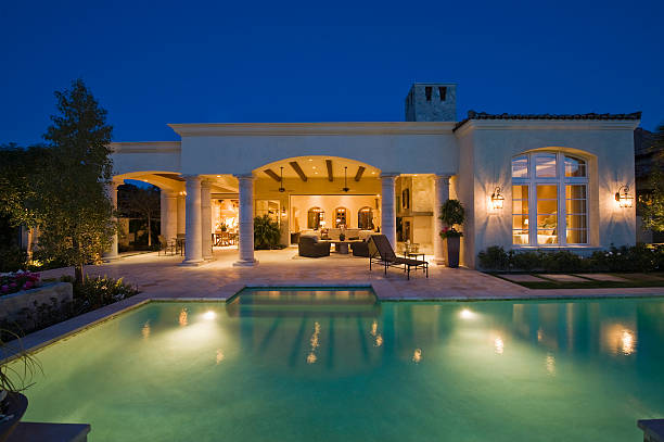 istock Lit Swimming Pool And Building Exterior 476227993