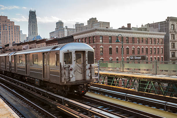 Train Approaching  Elevated Subway Station in Harlem, New York