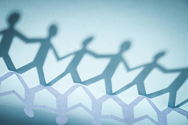 istock Group of people holding hands 476232990
