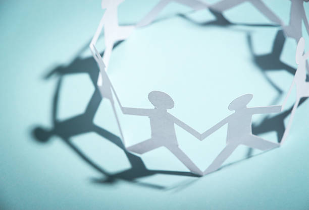 istock Group of people holding hands 476232998