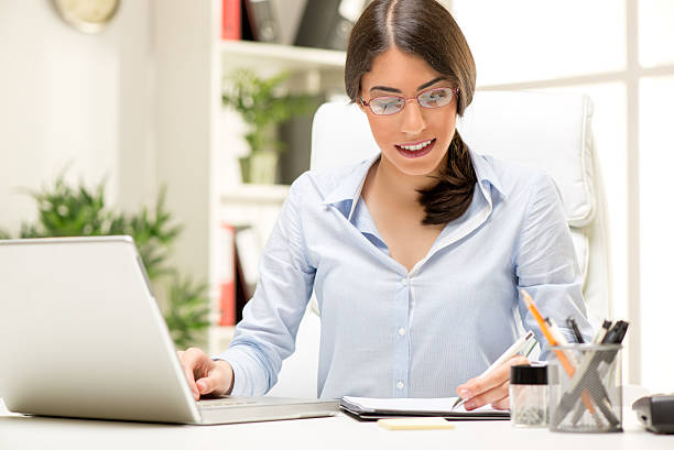 Left-Handed Businesswoman stock photo