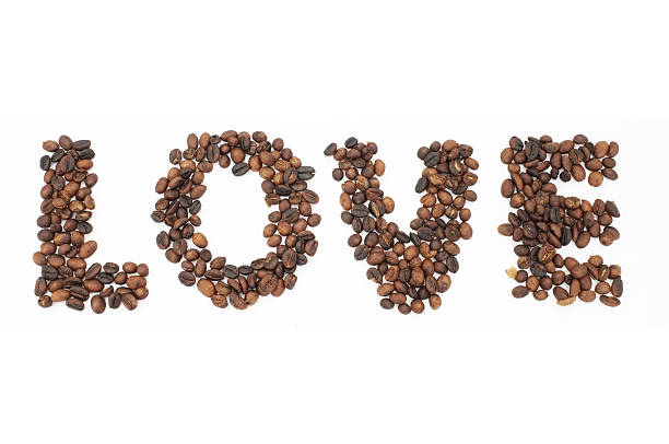 istock Roasted coffee beans in shape of alphabets, love 476234490