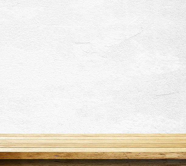 istock Empty wooden table over white cement wall, Product display 476238322