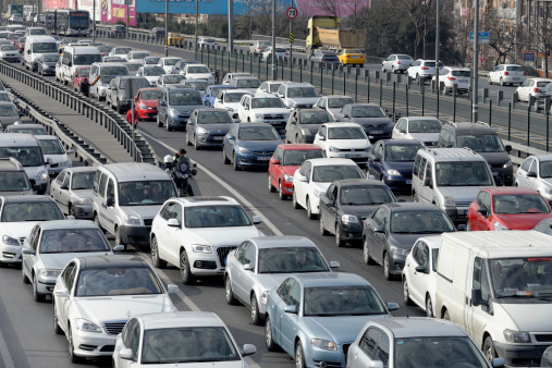 Istanbul, Turkey - February 8, 2014: Cars driving on Zincirlikuyu District in istanbul. Heavy traffic moves slowly on a Zincirlikuyu district in İstanbul are usually crowded.