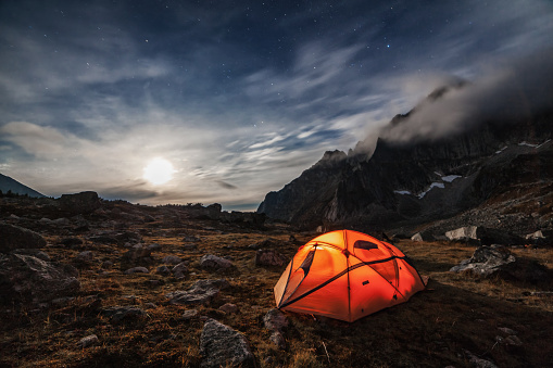 Camping in the mountains. Moon night