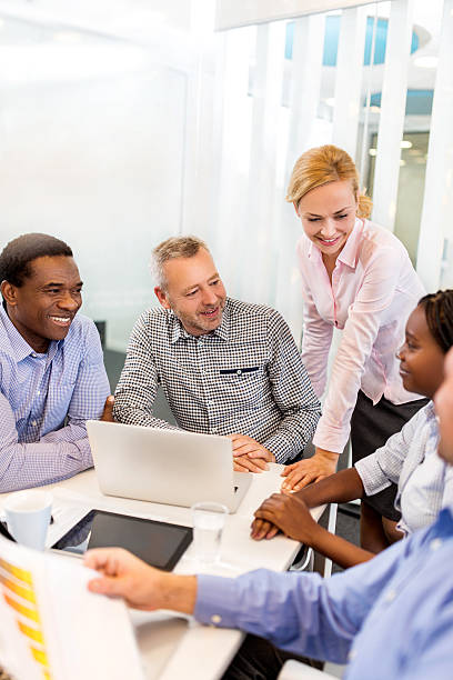 istock Happy business colleagues communicating on a meeting. 476244984