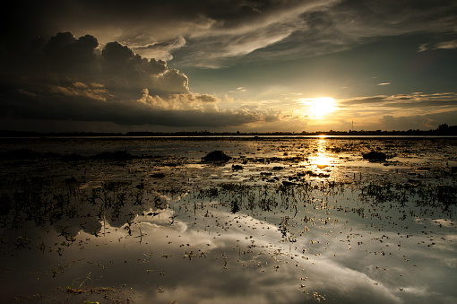 Sunsets on lake in Asia