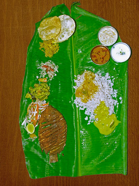 South Indian Thali (meals) with fish served traditionally on ban