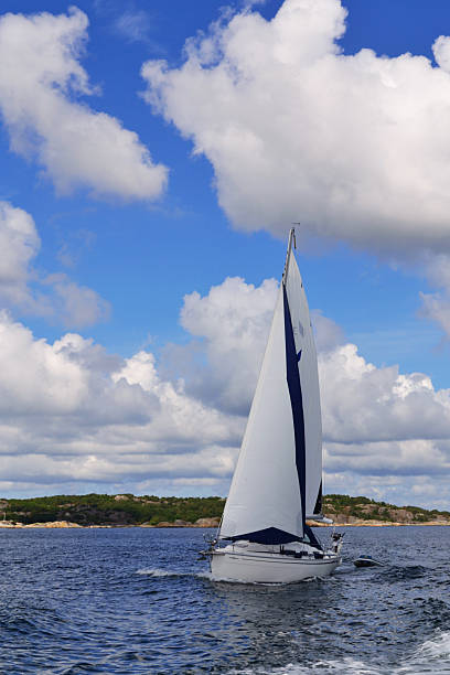 istock Single sail boat on the lake 476248017