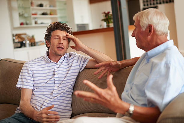 Dealing with disagreements Shot of a man and his father having an argumenthttp://195.154.178.81/DATA/i_collage/pu/shoots/804766.jpg irritation stock pictures, royalty-free photos & images