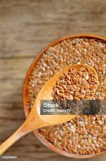 Close Up Of Flax Seeds And Wooden Spoon Stock Photo - Download Image Now - Brown, Dry, Flax Seed