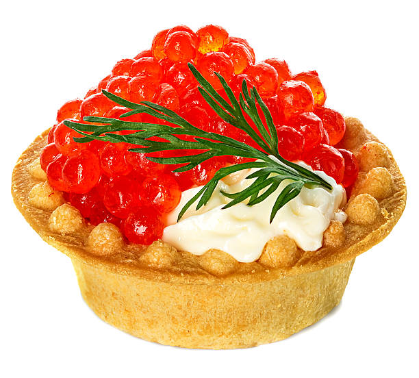 istock Tartlet with red caviar isolated on white background 476251392