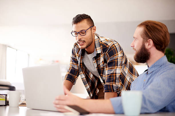 istock Collaborating in the creation of new software 476252066