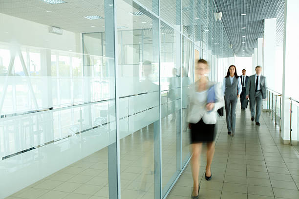 istock Businesspeople in corridor 476252164