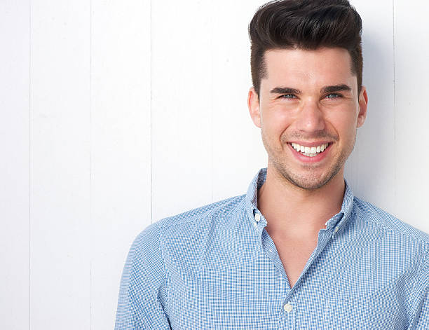 istock Portrait of a happy young man smiling 476253149