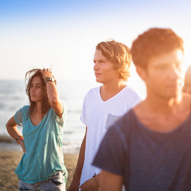 istock Group of friends on the beach 476259141