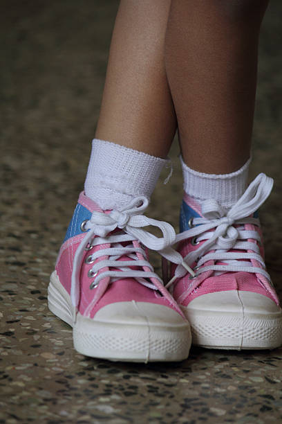 istock Girl with canvas shoes 476261890