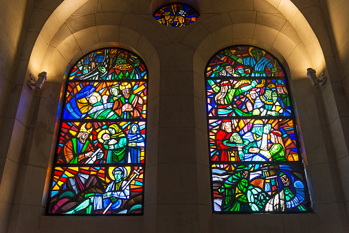 christian stained glass windows inside manila cathedral in philippines