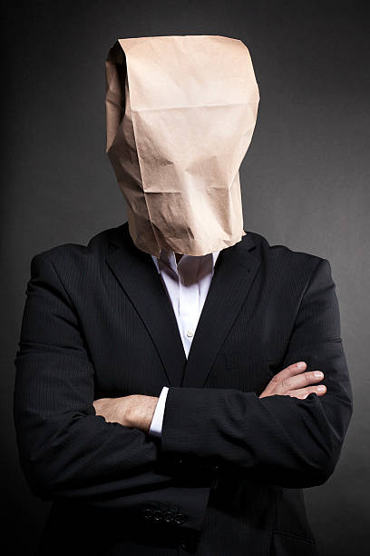 istock Man with paper bag on his head 476263677