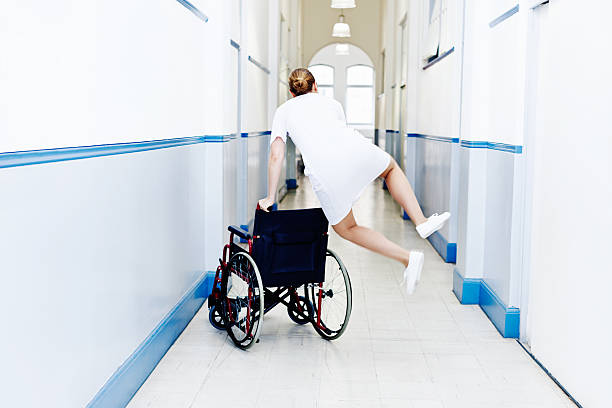 My shift is over! Zany, exuberant nurse jumps for joy.