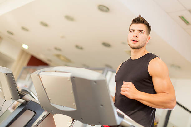 istock Young man training in the gym 476267029