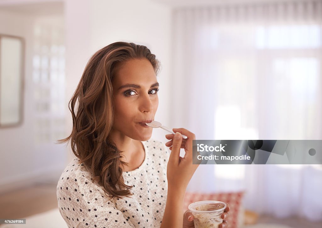 If we are what we eat then I'm sweet Shot of a woman having dessert at homehttp://195.154.178.81/DATA/i_collage/pu/shoots/804863.jpg Dessert - Sweet Food Stock Photo