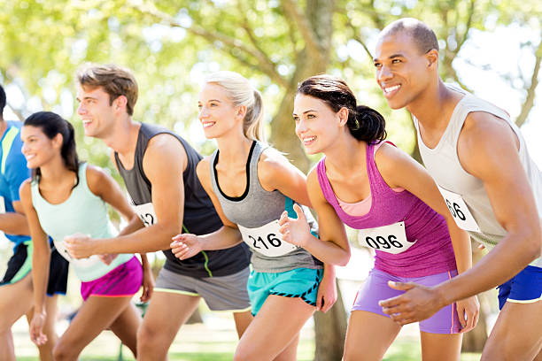 istock Smiling Group Of Marathon Runners At Starting Line 476269304